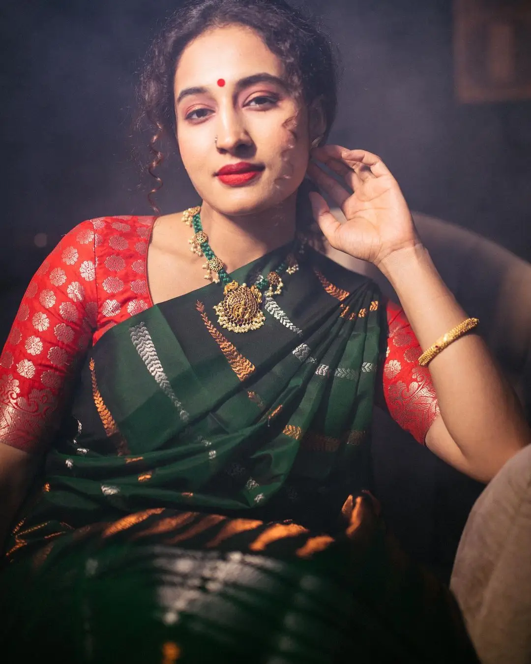 Pooja Ramachandran Stills in Green Saree Red Blouse